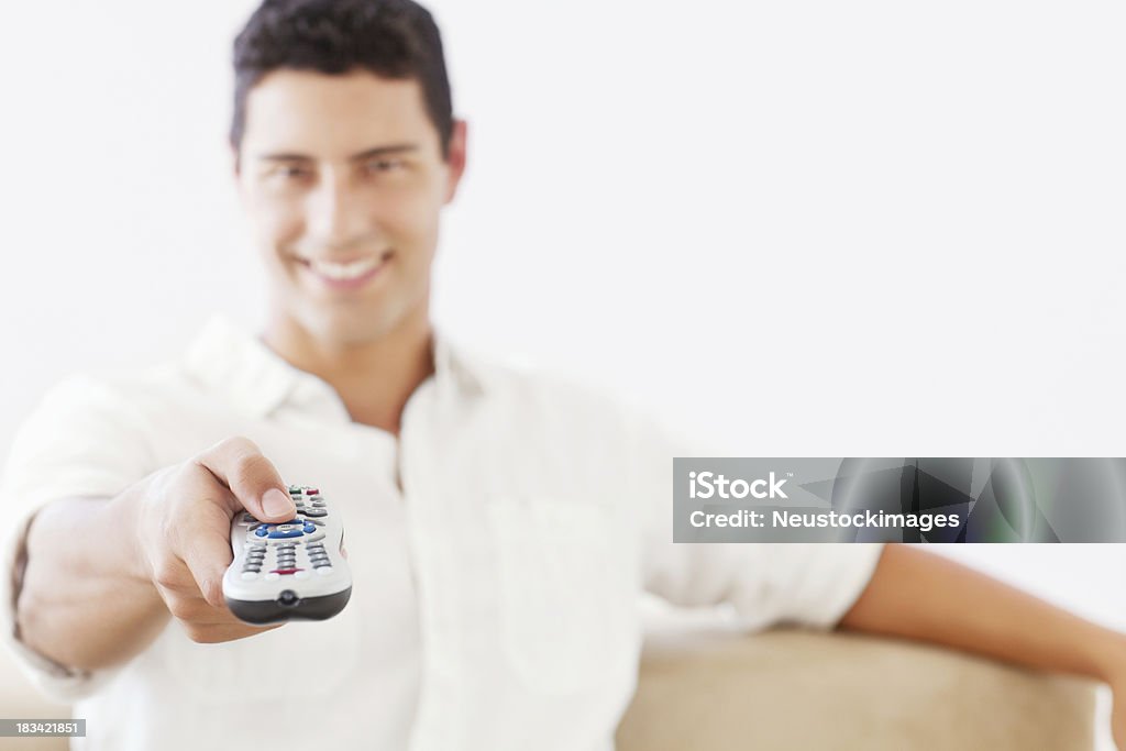 Man Using Remote Man Using A Television Remote Control Stock Photo - Download Image Now ...