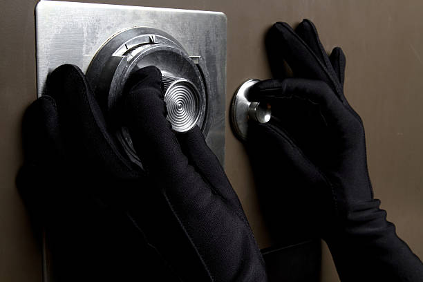 Thief Cracking a Safe stock photo