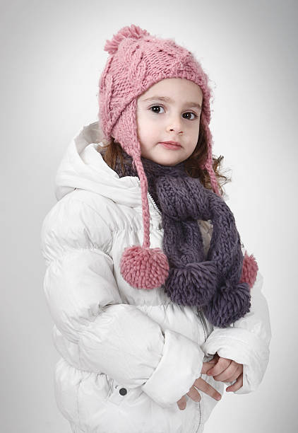 istock little boy with hat and scarf 183422226