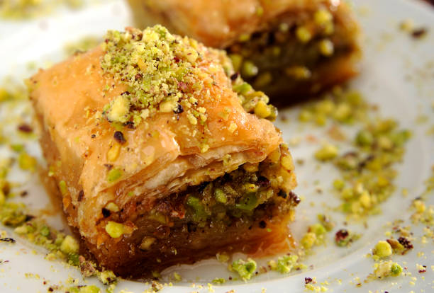 Perfect baklava with pistachio arranged on a white plate