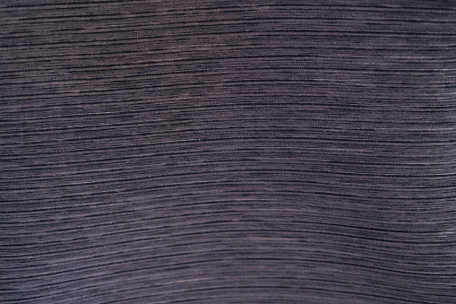 Horizontal blue gray and black fabric background