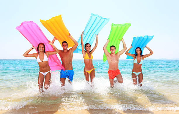istock Cheerful people are going out from the sea. 183422961