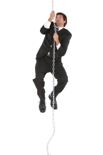 Handsome businessman climbing up a rope chainhttp://www.twodozendesign.info/i/1.png