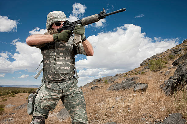 istock Soldier Patrolling in Desert 183423330