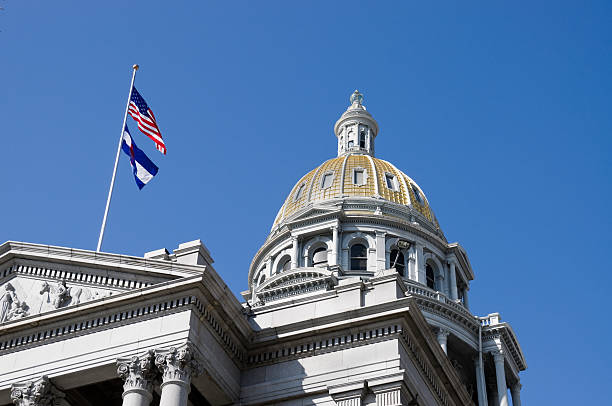 istock us capitol and flag in colorado 183423391