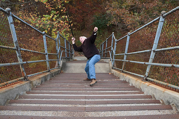 istock Senior Citizen Slipping on Concrete Steps 183423526