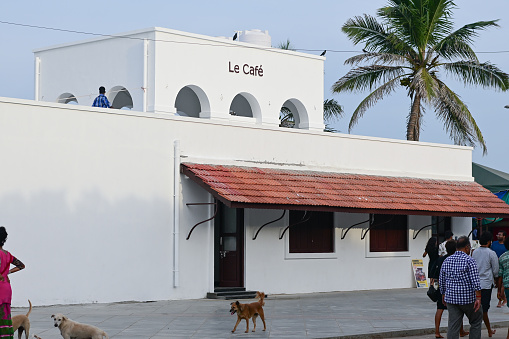 Pondicherry, India - July 15, 2023: Cafeteria along the Promenade beach, The popular stretch of beachfront in the city of Puducherry, India.