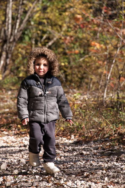 istock Toddler walking in the forest 1834241633
