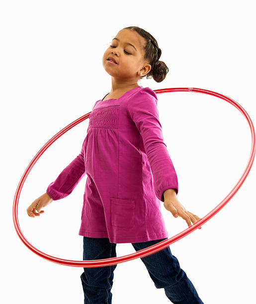 istock Smiling Young Girl with Hulahoop 183424537