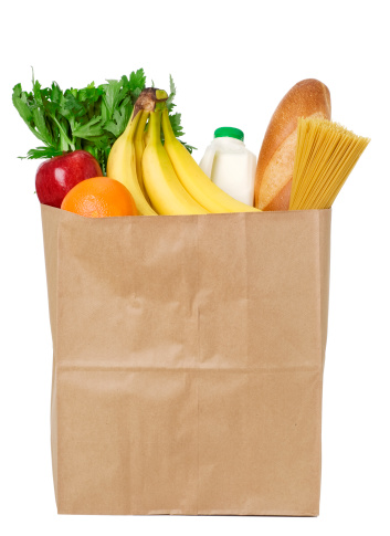Brown grocery bag with a variety of groceries.  Please see my portfolio for other food related images.