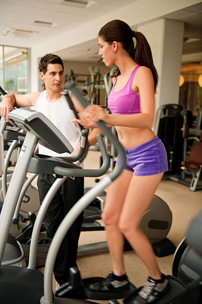 istock Indoor exercising with a help of instructor 183425467