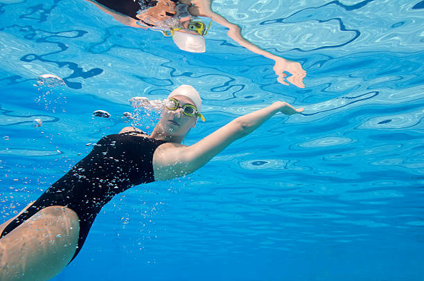 istock Attractive young woman underwater 183425641