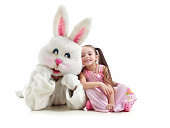 Little girl and bunny fighting