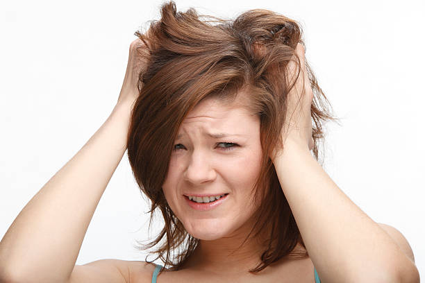 istock Stressed out woman is setting about the head 183425897