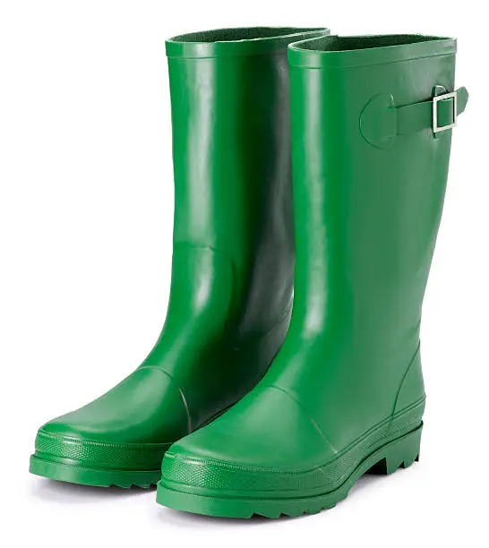 This is a photograph of a pair of green boots isolated on a pure white background.Click on the links below to view lightboxes.