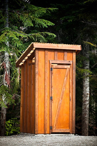 istock Outhouse washroom in forest 183426378