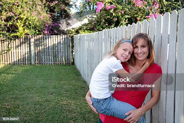 Daughter And Mom In Backyard Stock Photo - Download Image Now - 30-39 Years, Adult, Blond Hair