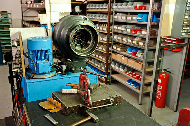 Hose crimping machine Hose crimping machine in a dirty workshop propeller machine stock pictures, royalty-free photos & images