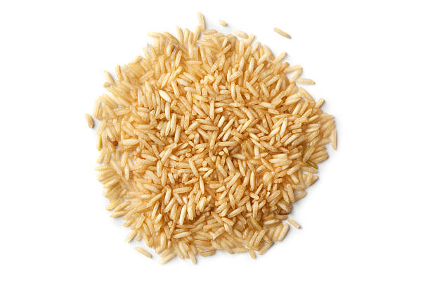frijoles, lentejas, arvejas y granos: arroz integral - brown rice fotos fotografías e imágenes de stock
