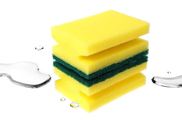 istock Yellow sponge with water isolated on white 183427476