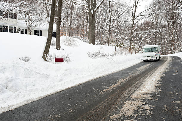 Mail Truck delivering letters in the snow