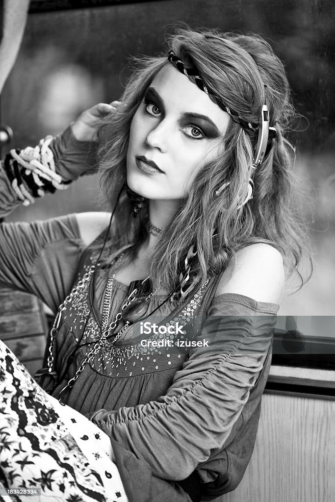 Beautiful hippie "Black and white portrait of a beautiful young adult woman wearing in hippie style, looking at camera." 20-24 Years Stock Photo
