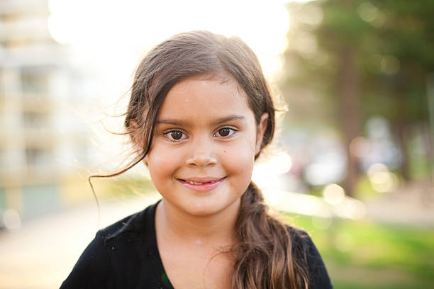 istock A happy young female enjoying the summer 183428534