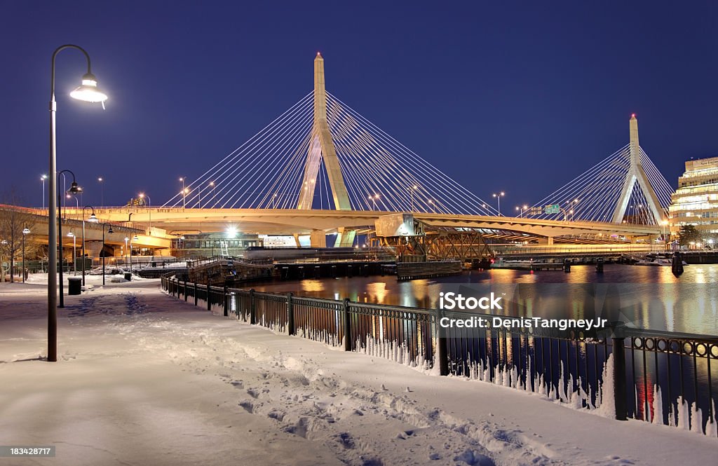Winter in Boston Zakim Bridge over the Charles River in winter. The Leonard P. Zakim Bunker Hill Bridge, is a cable-stayed bridge across the Charles River and was part of the Big Dig Project in Boston. The Big Dig, was the largest highway construction project in the United States. The Zakim Bridge is the widest cable-stayed bridge in the world.  Boston - Massachusetts Stock Photo