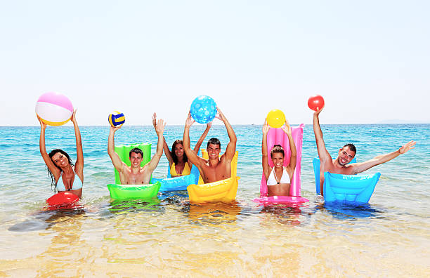 istock Group of friends is enjoying in the water. 183428811