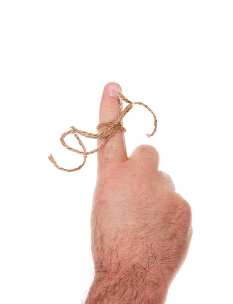 istock Male Hand with Twine Tied Around a Finger 183429503