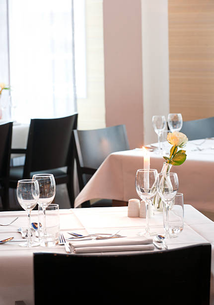 istock place setting on dining table in empty restaurant XXXL image 183429774