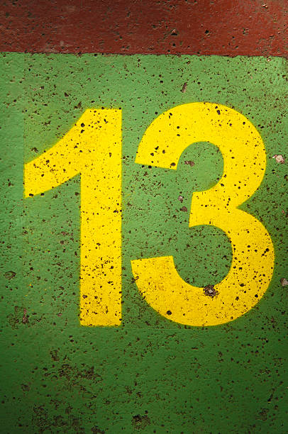 istock number 13 printet on a concrete floor 183430127