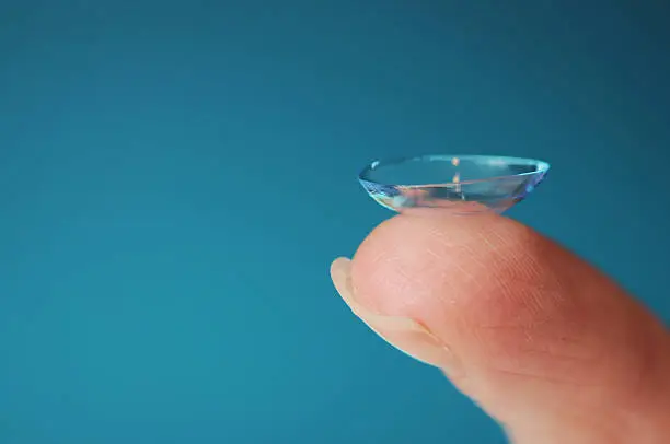Photo of Holding a contact lens on finger tip
