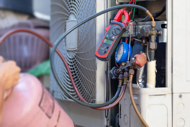 istock Air Conditioning Repair man hands checking and fixing modern air conditioning system, Technician team checking leakage air conditioning system 1834303762