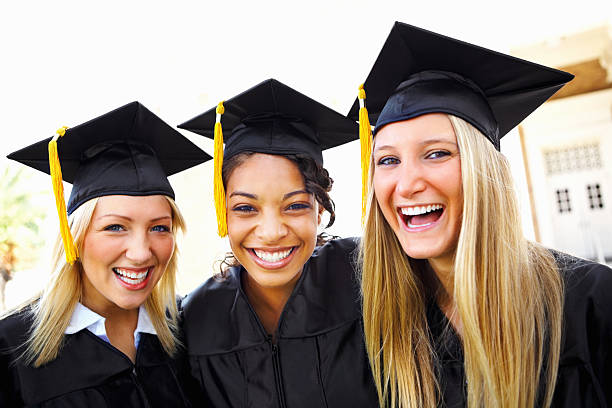 istock Happy graduating girls 183430659