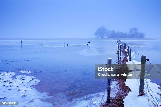 Flooded Frozen Floodplains At Dawn River Lek The Netherlands Stock Photo - Download Image Now