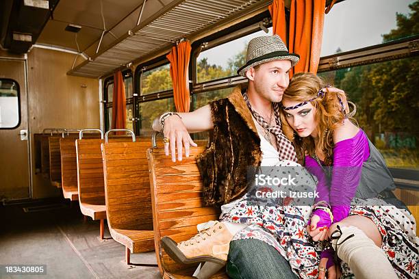 Hippie Young Couple In A Train Stock Photo - Download Image Now - Asking, Hippie, 20-24 Years