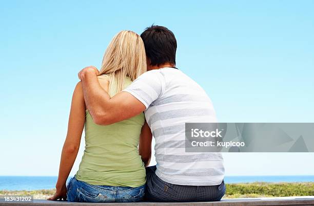 Couple Embracing Outdoors Stock Photo - Download Image Now - 20-29 Years, 30-39 Years, Adult