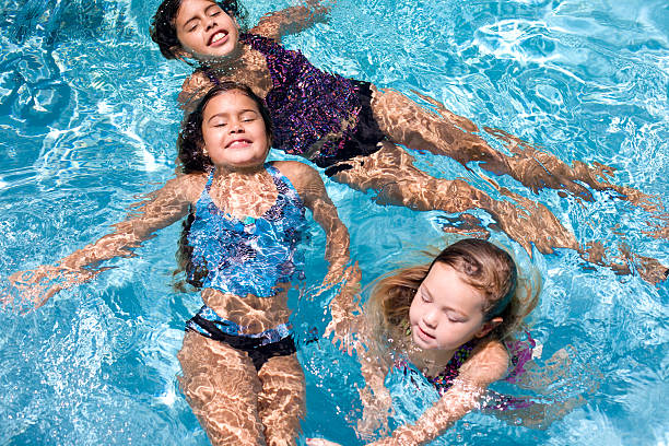 istock Young Girls Swimming 183431607