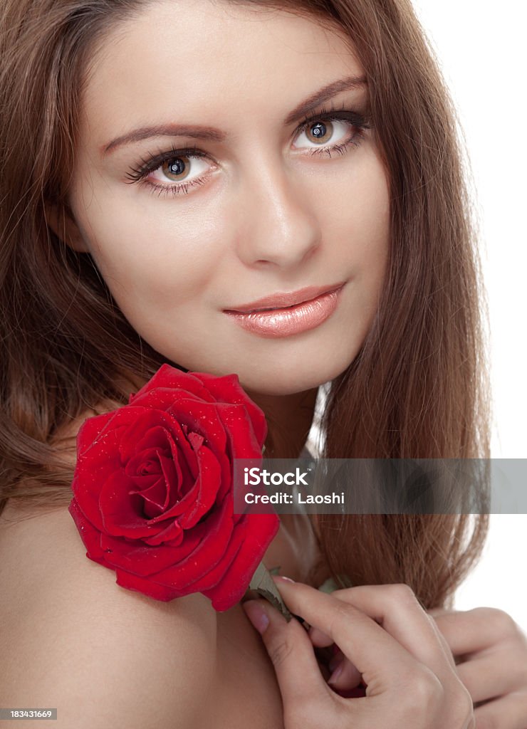 Natural Beauty Lady with the rose and beautiful makeup. 20-24 Years Stock Photo