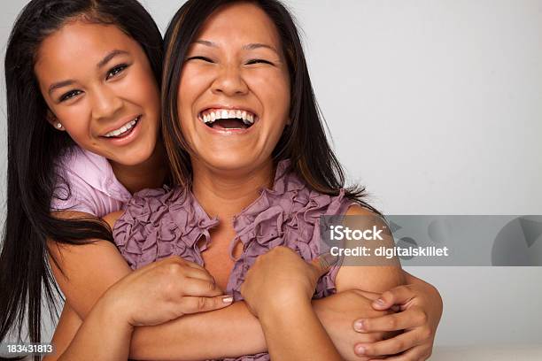 Mother And Daughter Laughing Stock Photo - Download Image Now - Mother, Teenager, Family