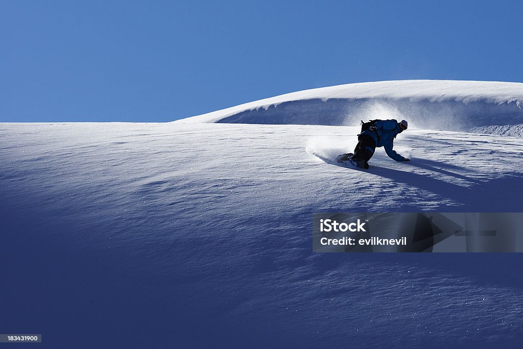 snowboarder freerider a snowboarder in fresh powdersnow riding down a hill.canon eos 1d mk3 & l glassPlease have a look at all of my SNOWBOARD-related pictures :) Powder Snow Stock Photo