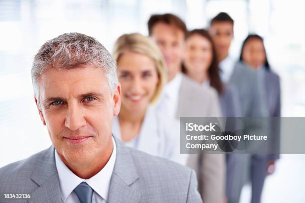 Confident Business Team In A Row Stock Photo - Download Image Now - Active Seniors, Administrator, Adult