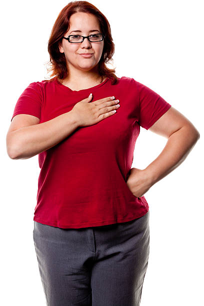 Woman Posing With Hand Over Heart