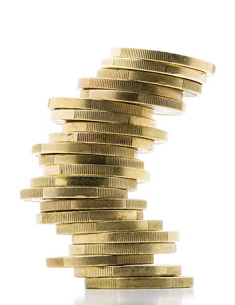 istock Coins stacked in balance 183433217
