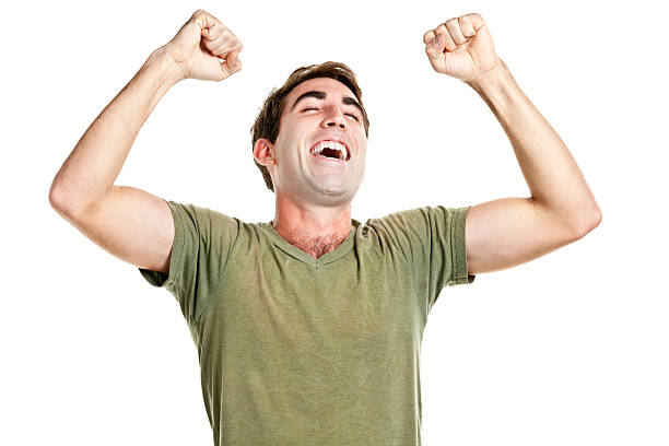 istock Ecstatic Happy Man Cheering And Shaking Fists 183433241