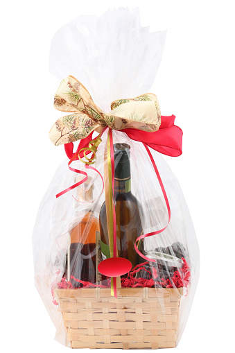 Gift basket with food on a white background.