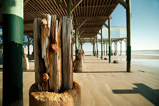 "Old and new beach building structures on beach at Galveston, TX"