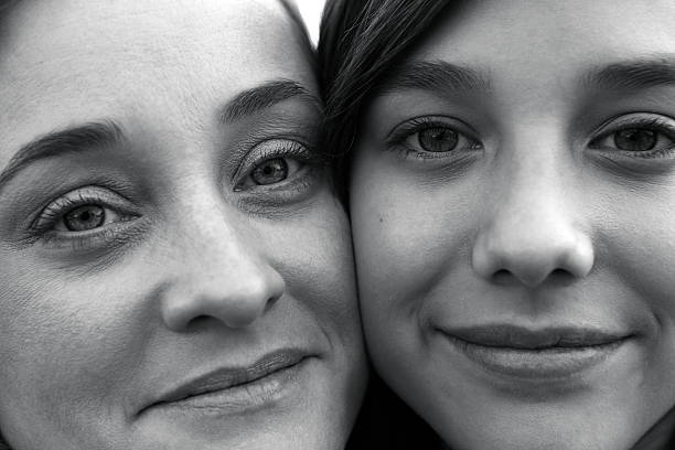 Beautiful Mother and Daughter Close Up
