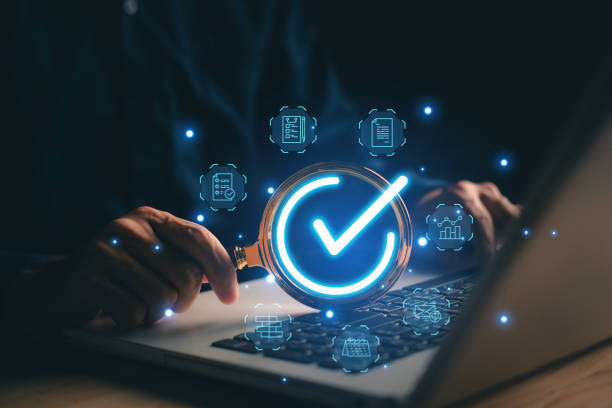 istock Quality control. Businessman assessment for certificate with sign correct in magnifying glass. ISO certification, Guarantee, Quality assurance, standard, Customer service evaluation satisfaction 1834363608